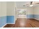 The living room provides a bright transition into the kitchen featuring updated appliances and fixtures at 304 Highland St, Brooksville, FL 34601