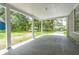 Covered patio with view of front yard and neighborhood at 304 Highland St, Brooksville, FL 34601