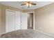This bedroom offers carpeted floors and leads to a closet and hallway at 14150 Prospect St, Spring Hill, FL 34609
