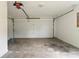 Spacious garage with a white door and a LiftMaster garage door opener at 14150 Prospect St, Spring Hill, FL 34609