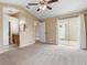 Main bedroom features a bathroom, vanity, and access to a patio at 14150 Prospect St, Spring Hill, FL 34609