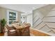 Charming dining room with a wooden table, stylish wicker chairs, and decorative accent wall at 2715 14Th N Ave, St Petersburg, FL 33713