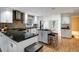 Modern kitchen with stainless appliances, white cabinets, and granite countertops at 2715 14Th N Ave, St Petersburg, FL 33713