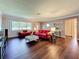 Spacious living room with hardwood floors, comfortable seating, and a welcoming atmosphere at 1137 Indian Rocks S Rd, Largo, FL 33770