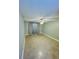 Bedroom with light blue walls, tile flooring, and a ceiling fan over the room at 6806 Monique Ave, Tampa, FL 33625