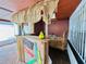 The covered patio shows the wet bar with wooden frame and open sign at 6806 Monique Ave, Tampa, FL 33625