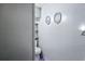 Small bathroom showing toilet, built-in storage, and wall decor at 242 Zoller St, Brooksville, FL 34601