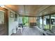 Relaxing screened porch with seating and outdoor views at 242 Zoller St, Brooksville, FL 34601