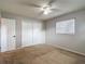 Bedroom features neutral walls, carpet flooring, standard closet and window at 7318 Tranquil Dr, Spring Hill, FL 34606