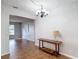 Charming dining room featuring a stylish chandelier and tile floors at 7318 Tranquil Dr, Spring Hill, FL 34606
