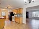 Lovely kitchen with oak cabinets and mosaic backsplash at 7318 Tranquil Dr, Spring Hill, FL 34606