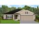 Charming single-story home featuring a spacious two-car garage and well-manicured lawn at 5494 Ocean Breeze Dr, Spring Hill, FL 34609