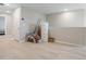 Spacious room with light hardwood floors and neutral walls, perfect for versatile use at 5528 Summer Sunset Dr, Apollo Beach, FL 33572