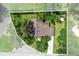 An aerial view shows the house, driveway, and property line at 39 Sunset Dr, Brooksville, FL 34601