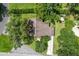 An aerial view shows the house, driveway, and surrounding trees at 39 Sunset Dr, Brooksville, FL 34601