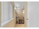Powder room with pedestal sink, mirror, and tiled floor at 39 Sunset Dr, Brooksville, FL 34601