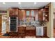 Gourmet kitchen showcasing custom cabinets, a copper sink, and stainless steel appliances at 39 Sunset Dr, Brooksville, FL 34601