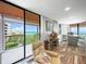 Relaxing living room with ocean view and easy access to balcony at 15316 Gulf Blvd # 301, Madeira Beach, FL 33708