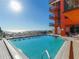 Refreshing community pool with ocean view at 15316 Gulf Blvd # 301, Madeira Beach, FL 33708
