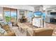 Living room with ocean views, comfortable seating, and open layout at 15316 Gulf Blvd # 301, Madeira Beach, FL 33708