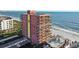Aerial view of beachfront building with parking at 15316 Gulf Blvd # 301, Madeira Beach, FL 33708