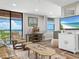Living room with ocean view and stylish decor at 15316 Gulf Blvd # 301, Madeira Beach, FL 33708