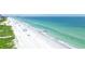 Expansive beach view with clear water at 15316 Gulf Blvd # 301, Madeira Beach, FL 33708