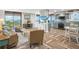 Open living space with ocean view, comfy seating, and stylish decor at 15316 Gulf Blvd # 301, Madeira Beach, FL 33708