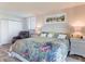 Spacious bedroom with king-size bed and decorative bedding at 15316 Gulf Blvd # 301, Madeira Beach, FL 33708
