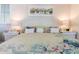 Bedroom with coastal decor and a large bed at 15316 Gulf Blvd # 301, Madeira Beach, FL 33708