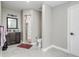 Bathroom featuring a dark wood vanity, shower, and tile flooring at 6628 1St N St, St Petersburg, FL 33702