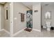 Bathroom with shower, toilet, and decorative mirror at 6628 1St N St, St Petersburg, FL 33702