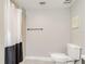 Bathroom with shower, toilet, and tiled floor at 6628 1St N St, St Petersburg, FL 33702