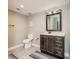 Bathroom with vanity, toilet, and tiled floor at 6628 1St N St, St Petersburg, FL 33702