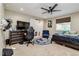 Bedroom featuring a ceiling fan, gaming setup, and a bed at 6628 1St N St, St Petersburg, FL 33702