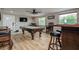 Inviting game room with a pool table, bar, and ample seating at 6628 1St N St, St Petersburg, FL 33702