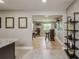 Open-concept kitchen and bar area with view to game room at 6628 1St N St, St Petersburg, FL 33702