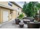 Paved patio area with outdoor seating and lush greenery at 6628 1St N St, St Petersburg, FL 33702