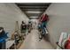 Long, narrow storage room with kayaks, bikes, and various other items at 6628 1St N St, St Petersburg, FL 33702