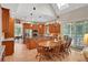 Spacious kitchen with wood cabinets, granite counters, and island at 8608 Poinsettia Dr, Temple Terrace, FL 33637