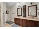 Elegant bathroom with double vanity and tile flooring at 8608 Poinsettia Dr, Temple Terrace, FL 33637