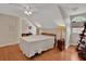 Charming bedroom with hardwood floors and a vaulted ceiling at 8608 Poinsettia Dr, Temple Terrace, FL 33637