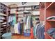 Large walk-in closet with ample shelving and hanging space at 8608 Poinsettia Dr, Temple Terrace, FL 33637
