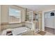 Relaxing bathroom with soaking tub and walk-in shower at 11928 Frost Aster Dr, Riverview, FL 33579