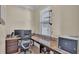 Home office with built-in desk, granite countertop, and plenty of storage at 11928 Frost Aster Dr, Riverview, FL 33579