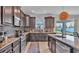 Modern kitchen with stainless steel appliances and granite countertops at 11928 Frost Aster Dr, Riverview, FL 33579