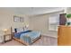 Bedroom with a double bed and carpeted floor at 11928 Frost Aster Dr, Riverview, FL 33579