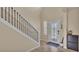 Inviting entryway with decorative door and staircase at 11928 Frost Aster Dr, Riverview, FL 33579