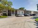Building exterior showcasing parking and landscaping at 2625 State Road 590 # 124, Clearwater, FL 33759