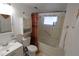 Clean bathroom with a bathtub shower, vanity, and medicine cabinet at 6702 71St N Ave, Pinellas Park, FL 33781